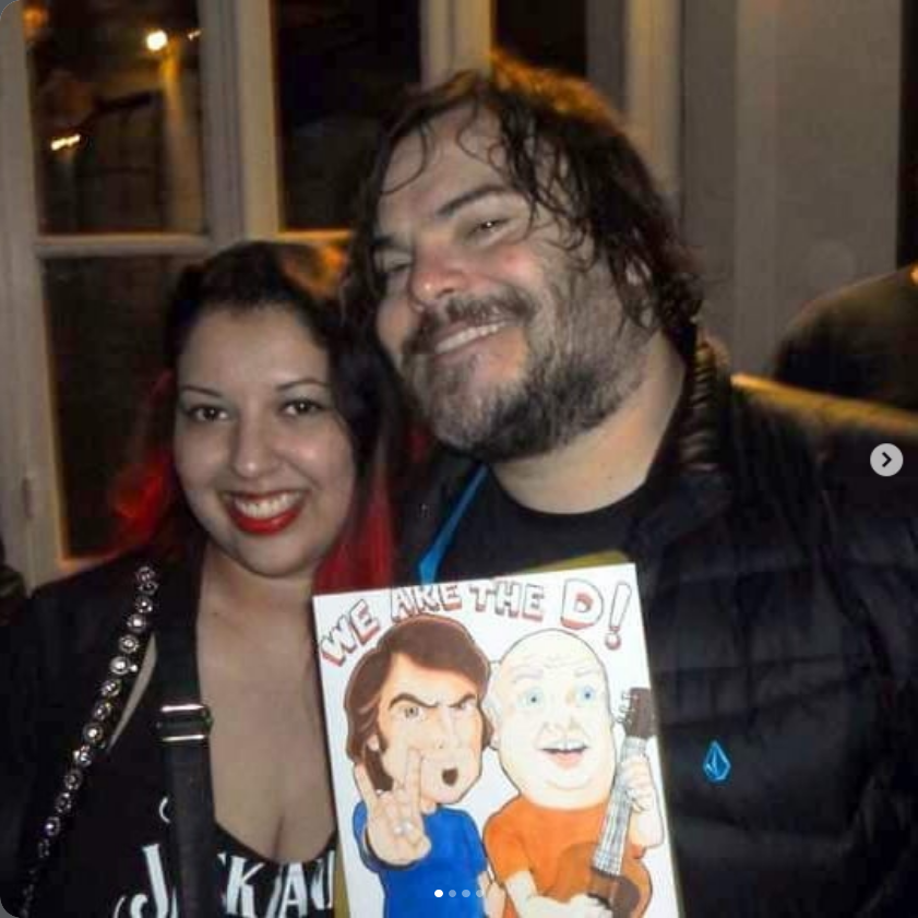 Lita photographiée avec Jack Black, acteur et chanteur de Tenacious D